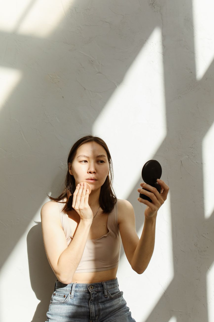 Woman doing skincare routine, natural beauty moment